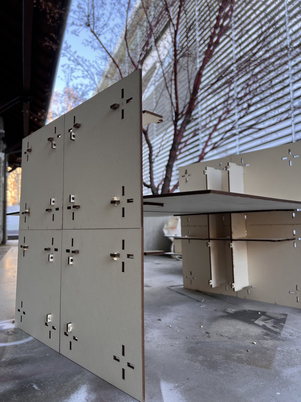 CRUX — wall panel and table modules combined outdoors