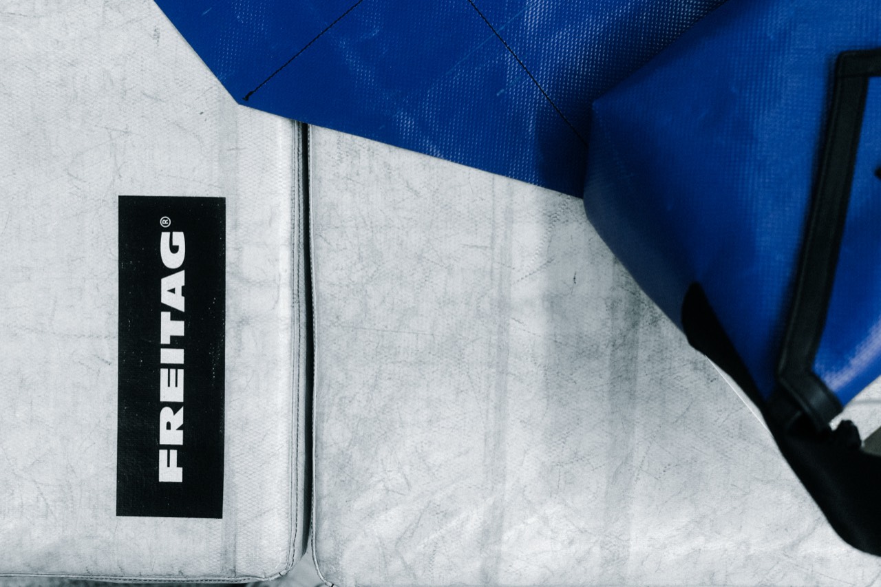 F11 Break — FREITAG label detail on the tarp fabric